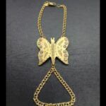 Manita oro amarillo 18k con motivo mariposa con circonitas blancas (18 cm)