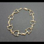 Pulsera oro amarillo 18k eslabones forma estribo(19 cm)