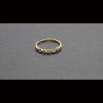 Anillo oro amarillo 18k nº 15,5 con 7 brillantes de 0,03 qt,total 0,21 qt