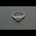 Anillo oro blanco 18k nº 16,5 con 10 brillantes de 0,02 qt y 1 brill.de 0,05 qt ;total 0,25 qt