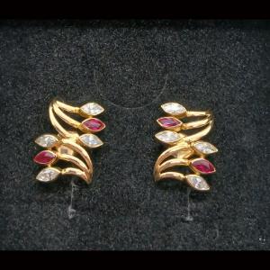 Pendientes oro amarillo 18k formando hojas de circonitas blancas y rosas,cierre forma mariposa
