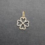 Colgante oro amarillo y blanco 18k forma trebol con circonitas blancas