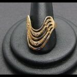Anillo oro amarillo 18k con forma de ondas y circonitas nº 17
