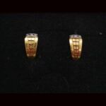 Pendientes oro amarillo 18k con circonitas blancas y cierre tipo omega