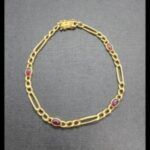 Pulsera oro amarillo 18k forma cartier con piedras color rosa(21 cm)