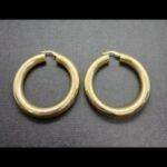 Argollas oro amarillo 18k forma redondeada lisas