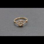 Anillo oro amarillo 18k nº 15 parte central forma doble nudo