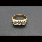 Anillo oro amarillo 18k con tres circonitas nº 24
