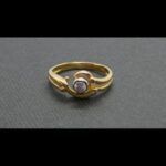 Anillo oro amarillo 18k con brillante de 0,20 qt engarzado en oro blanco