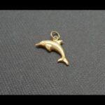 Colgante oro amarillo 18k forma delfín