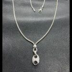 Cadena oro blanco 18k de 41 cm con colgante forma de calabrote con puntas de brillantes