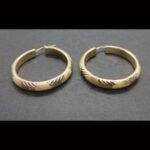Argollas oro amarillo 18k con dibujos mate y brillo