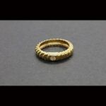 Anillo oro amarillo 18k forma rizada con brillante de 0,10qt nº12