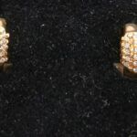 Pendientes oro amarillo 18k con puntas de brillantes ,cierre Omega
