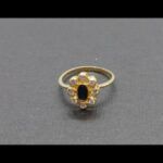 Anillo oro amarillo 18k nº 10 con circonitas blancas y piedra central azul