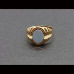 Sello oro amarillo 18k con piedra celeste nº 18,5