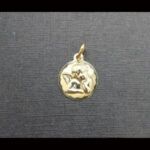 Medalla oro amarillo 18k con imagen de un ángel