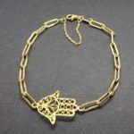 Pulsera oro amarillo 18k eslabones ovalados con mano de Fátima con cadena de seguridad 20 cm