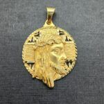 Colgante oro marillo con el rostro de Cristo