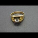 Anillo oro amarillo 18knº 30 tipo solitario con circonita y piedra negra