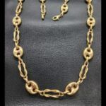 Cadena oro amarillo 18k de 60 cm eslabones de calabrote y forma nudo marinero