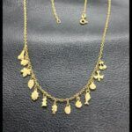 Gargantilla oro amarillo 18k de 47 cm con colgantes de dferentes motivos