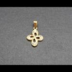 Cruz oro amarillo 18k con circonitas blancas