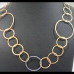 Cadena larga oro amarillo rosa y blanco 18k con forma de circulos de varios tamaños 89,5 cm