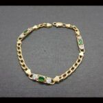 Pulsera oro amarillo 18k con eslabón alargado circonitas blancas y verdes(19 cm)