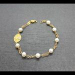 Pulsera oro amarillo 18k con perlas blancas 16,5 cm