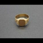 Sello oro amarillo 18k con dibujos a los lados nº 18