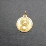 Medalla oro amarillo 18k de la virgen niña