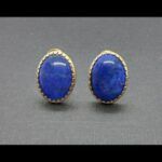 Pendientes oro amarillo 18k con piedras ovaladas de color azul cierre tipo omega