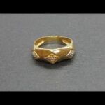 Anillo oro amarillo 18k con formas de triangulos decorados con circonitas nº 11