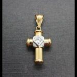Cruz oro amarillo y blanco 18k con circonita en el centro