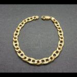 Pulsera oro amarillo 18 qt eslabón ovalado con barra(19 cm)