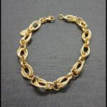 Pulsera oro amarillo 18 qt con doble eslabón entrelazado(18 cm)