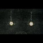 Pendientes oro amarillo 18k con forma de estrella decorado con circonita, cierre tipo rosca