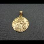 Medalla oro amarillo 18k con la imagen de un ángel