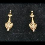 Pendientes oro amarillo 18k labrados con circonitas