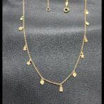 Cadena oro amarillo 18k con colgantes forma corazón estrella y oso de Tous 43 cm