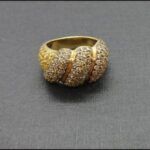 Anillo oro amarillo 18k con circonitas amarillas y marrones nº 17