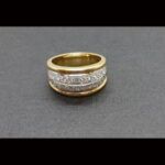 Anillo oro amarillo 18k con brillantes montado en oro blanco, total 0,66qtes nº 14,5