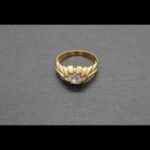 Solitario oro amarillo 18 qt nº 23,5 con circonita blanca