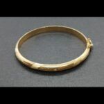 Pulsera oro amarillo 18k tipo caña con dibujos