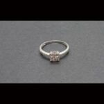 Anillo oro blanco 18k tipo solitario con puntas de brillantes nº 16