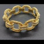 Pulsera oro amarillo 18k, eslabones con forma redonda tipo cordón con 40 brillantes de 0,03qtes cada uno total 1,3qte