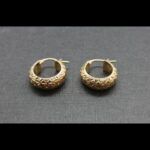 Argollas oro amarillo 18k con dibujos