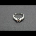 Anillo oro blanco 18 qt nº 11 con brillante de 0,10 qt