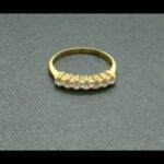 Alianza oro amarillo 18k con 7 brillantes de 0,10qtes cada uno, total; 0,7qtes nº 20